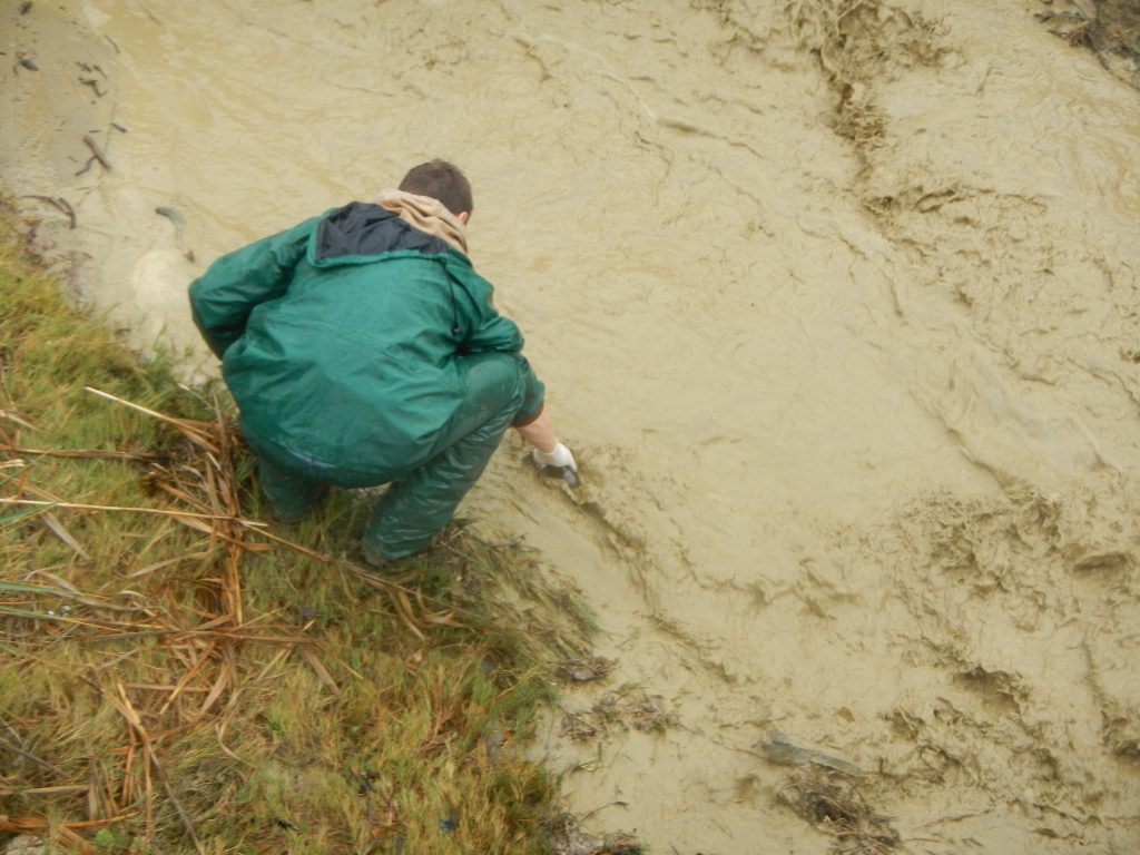 Sampling stormwater runoff from a coastal watershed to determine how sediment, metals, nutrients and salts are changing throughout a three day winter storm.